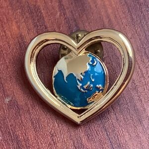 Vintage Avon Gold Tone Heart Holding World Pin with Ballou Pin Back